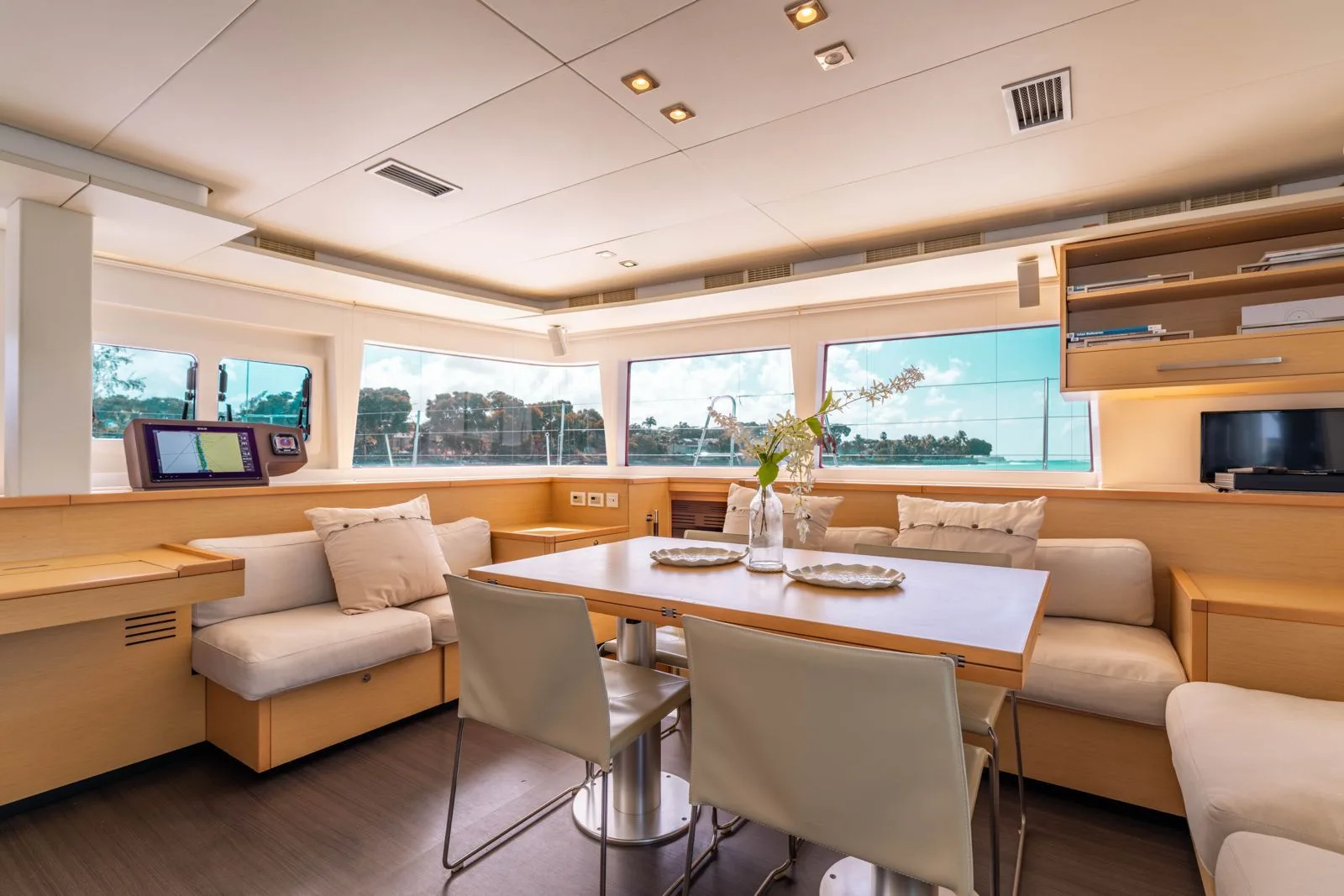 Breezy Days salon and dining table with coastal view