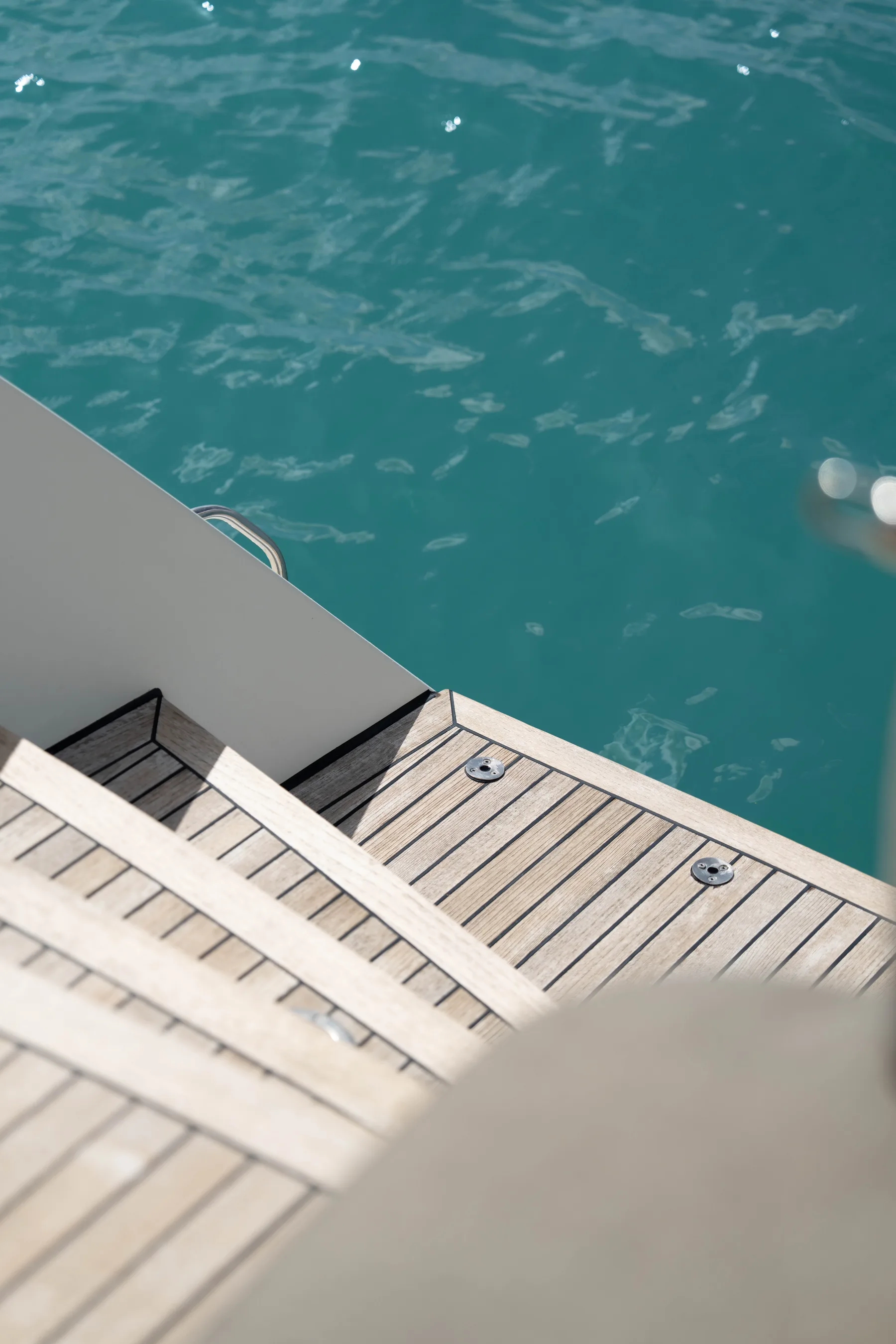 Swim platform above clear blue water